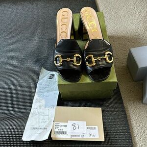 Women’s Gucci black heel sandals